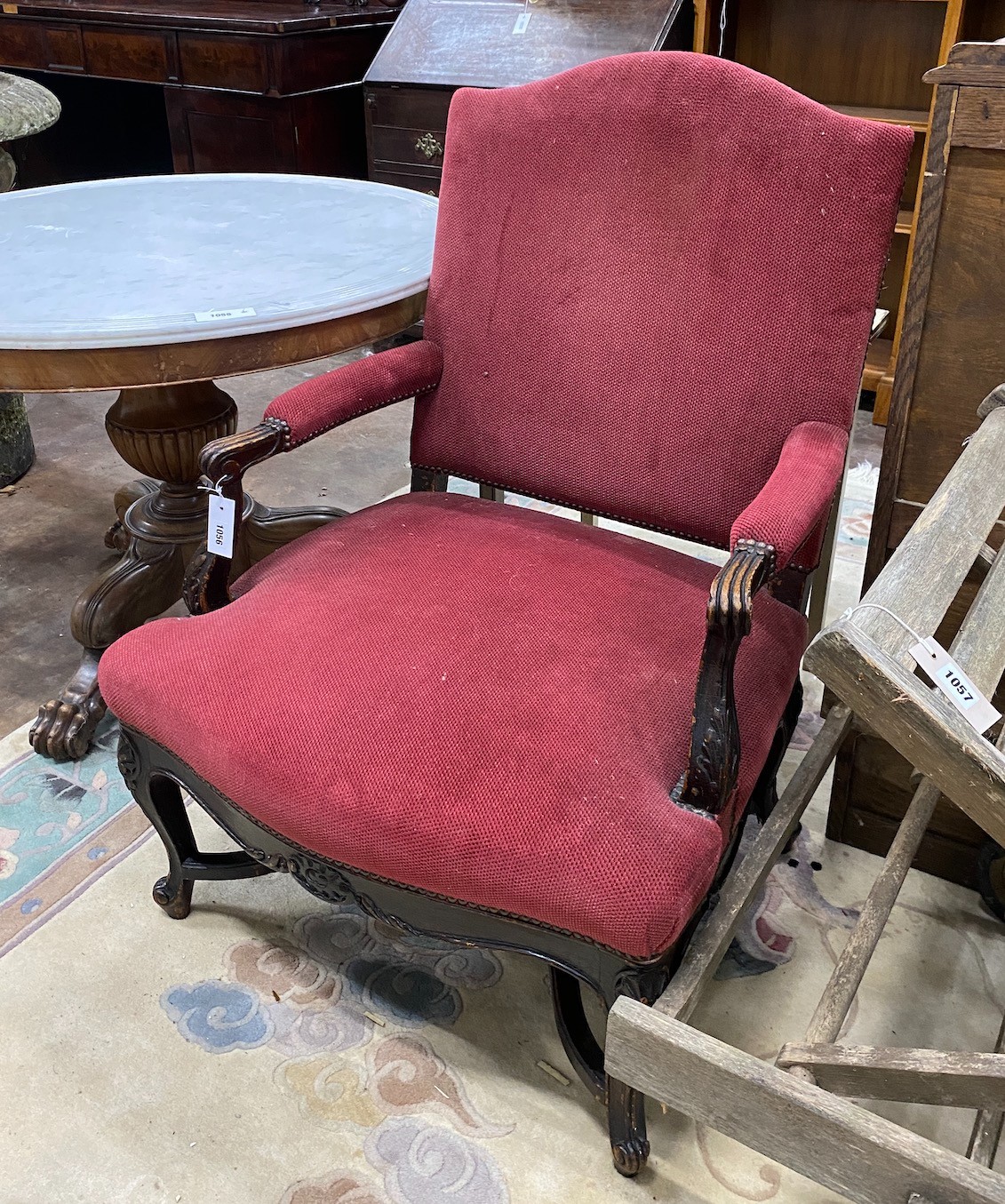 A 19th century French upholstered oak open armchair, width 72cm, depth 58cm, height 93cm